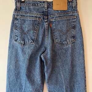 Vintage 90’s Orange Tab Levi’s perfectly worn in high waisted tapered legs size 4 Med