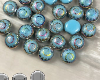 May include: A collection of 18 turquoise glass beads with a swirl design. The beads are iridescent and have a metallic sheen. There are also three plain turquoise beads in the image.
