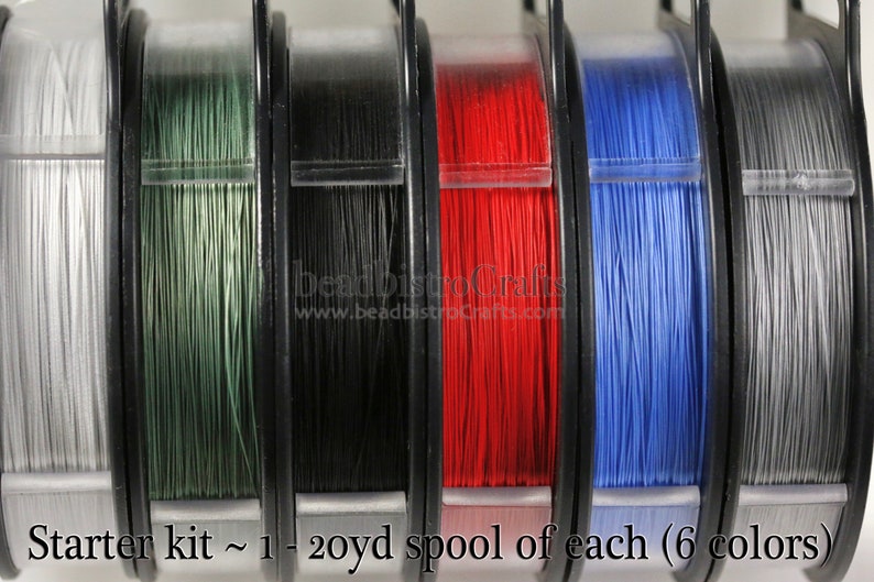 May include: A starter kit of six spools of beading wire, each spool containing 20 yards of wire. The colors are silver, green, black, red, blue, and gray.