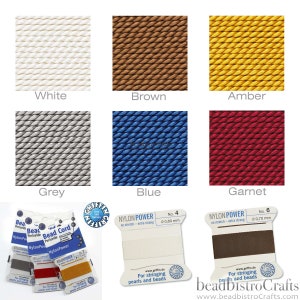 May include: Assortment of nylon bead cord in various colors, including white, brown, amber, grey, blue, and garnet. The cord is wound on spools and labeled "Nylon Power" with the size and color.