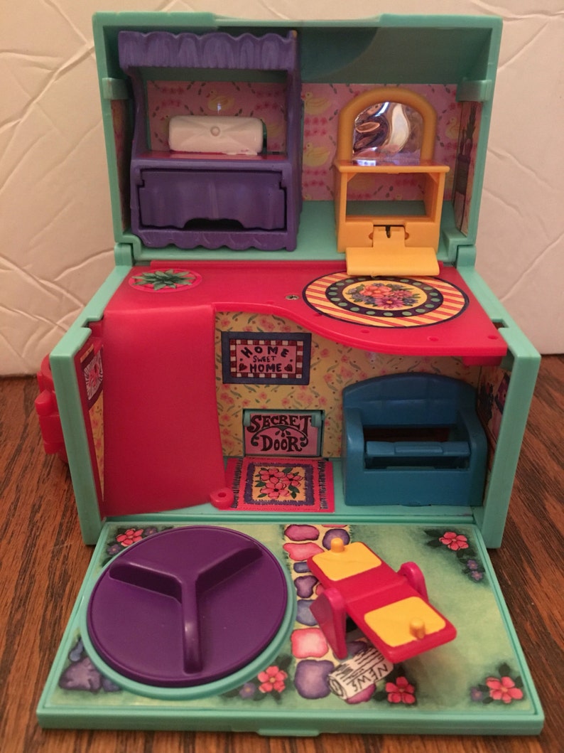 polly pocket suitcase house
