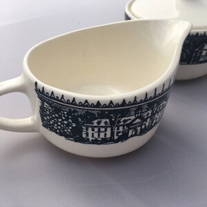 Blue currier and Ives by Taylor Smith blue creamer
