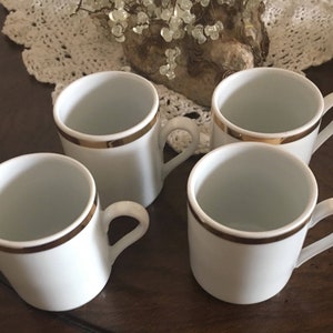 Demitasse cups white with gold rim