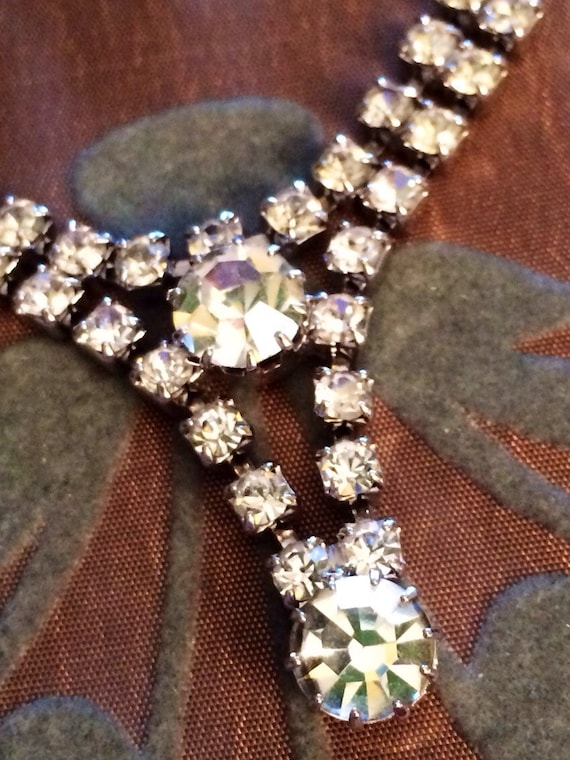 Items similar to Vintage Rhinestone Necklace Featuring V Drops on Etsy