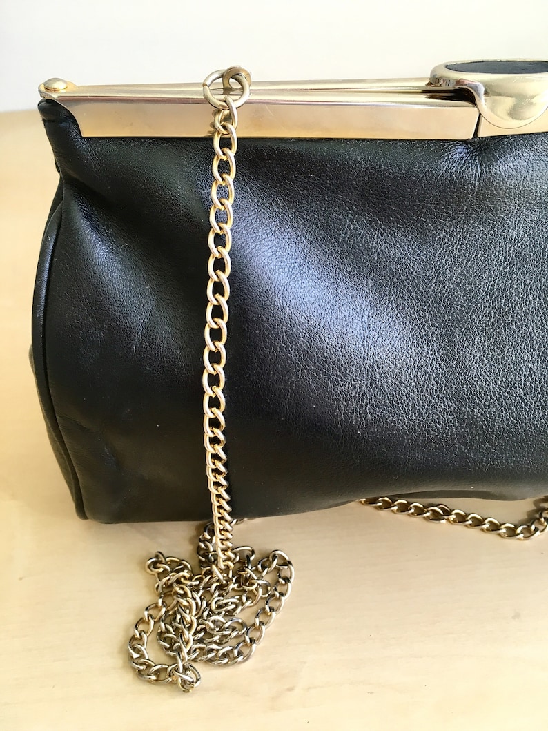 Beautiful Unique Frame Opening Purse
