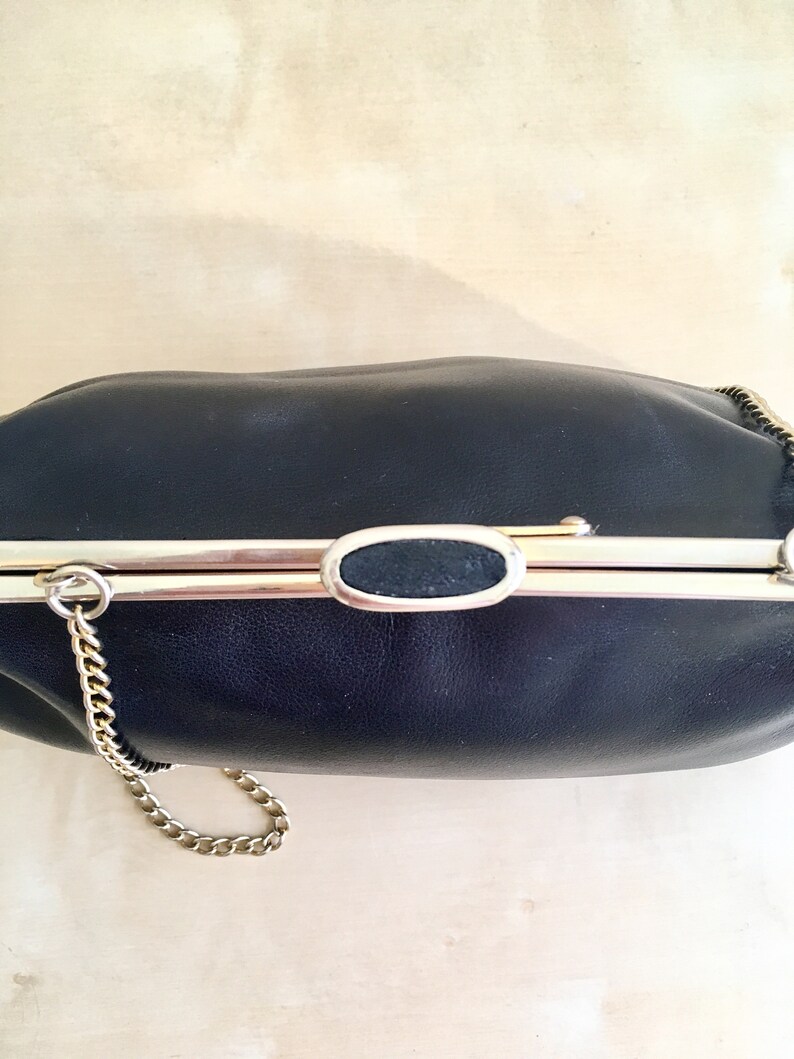Beautiful Unique Frame Opening Purse