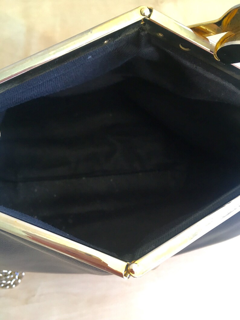 Beautiful Unique Frame Opening Purse