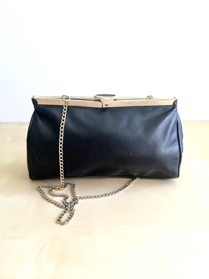 Beautiful Unique Frame Opening Purse