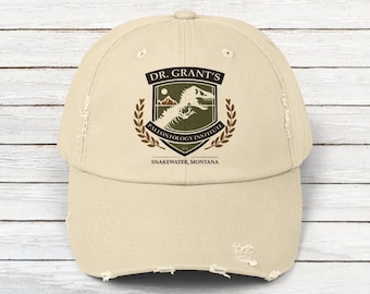 Gorra con aspecto desgastado inspirada en Jurassic Park / Instituto de Paleontología Dr. Alan Grant