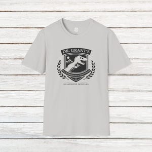 Dr. Alan Grant&#39;s Paleontology Institute T-Shirt | Jurassic Park Inspired Unisex Tee | Subtle Dinosaur Fan Apparel