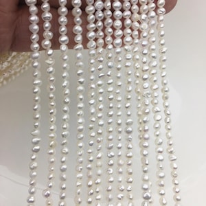 Perlas de semilla de pepita blanca AA de 3-4 mm, hebra de perlas de agua dulce de pepita irregular, precio barato, fábrica de perlas china, LM3-2A-5