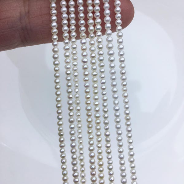 AA+ 2-2.5mm tiny white near round seed freshwater pearl,genuine pearl strands at wholesale prices,RP2-3A-7
