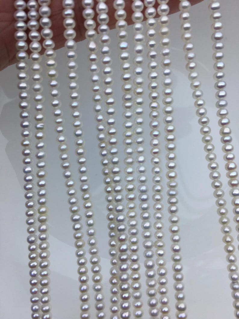AAA 3-3.5 mm winziger weißer Knopf rund Süßwasserperlen, Kernperle, Rondell Perlen, SM3-3A-31 Bild 3