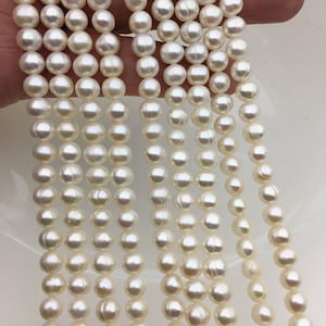 20% OFF AA 5-6mm white little Ring potato freshwater pearl,near round white pearl bead strand supply from China, wholesale in bulk,CR5-A-1