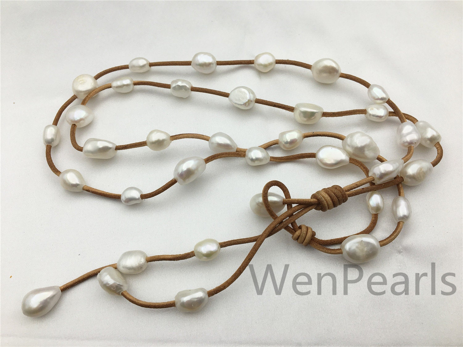 Two Rows Baroque pearl leather necklacePearl and Leather -  Portugal