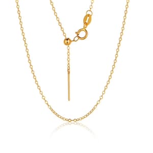 May include: A gold chain necklace with a lobster clasp and an adjustable length. The chain is made of small, round links.