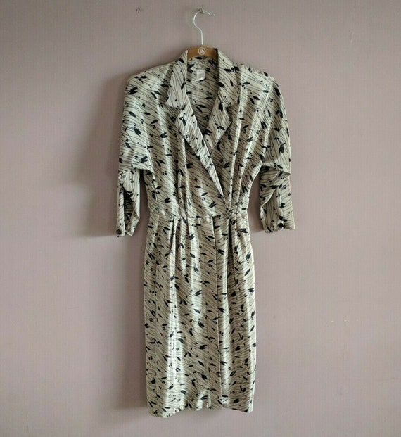 black and gold wrap dress