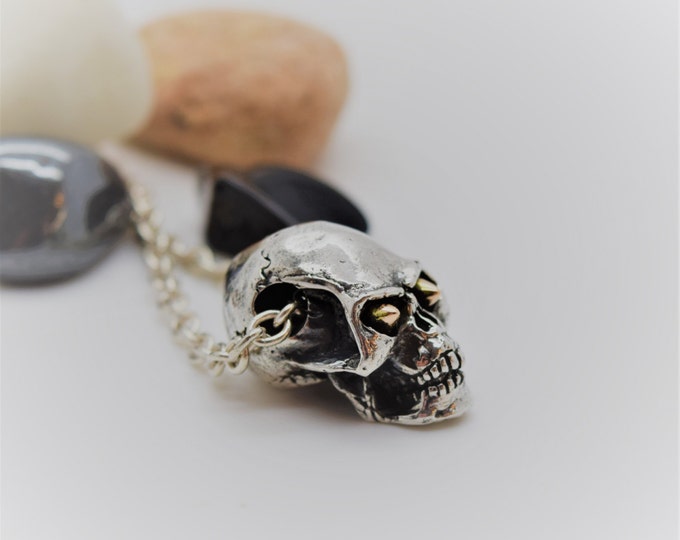 Handmade Silver Skull Necklace With Rose Gold Eyes, Douglas Hughes Design