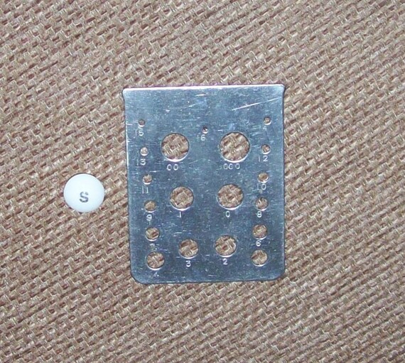 Vintage Knitting Needle Guage Metal Guage With Holes From Old Uk Needles Sizes 16 Through 000 Us 4 0 To 15 See Photo For Size No Rust Vintage Knitting Needle Guage Metal Guage With Holes From Old Uk Needles Sizes 16 Through 000 Us 4 0 To 15 See Photo For Size No Rust