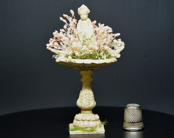 Cup on stand with floral composition of preserved flowers Cherub in the center Pastel colors Miniature scale 1/12 Dolls house