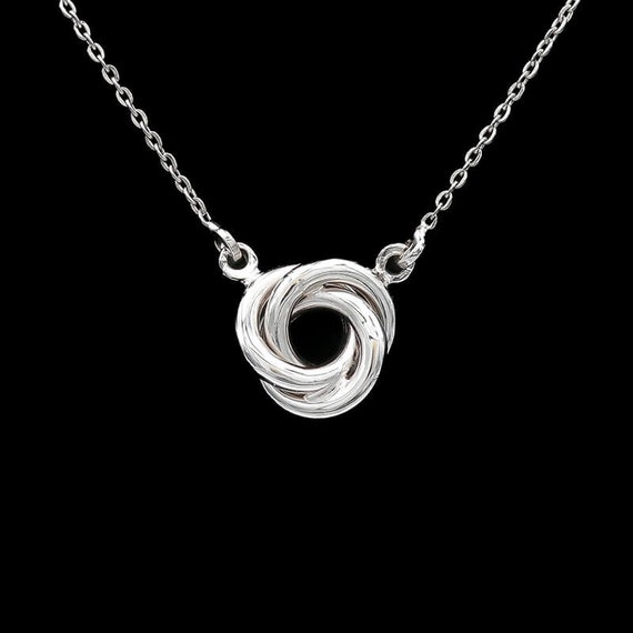 Amazon.com: Timeless Love Diamond Accent Love Knot Shaped Pendant Set in  Sterling Silver, Necklace with 18