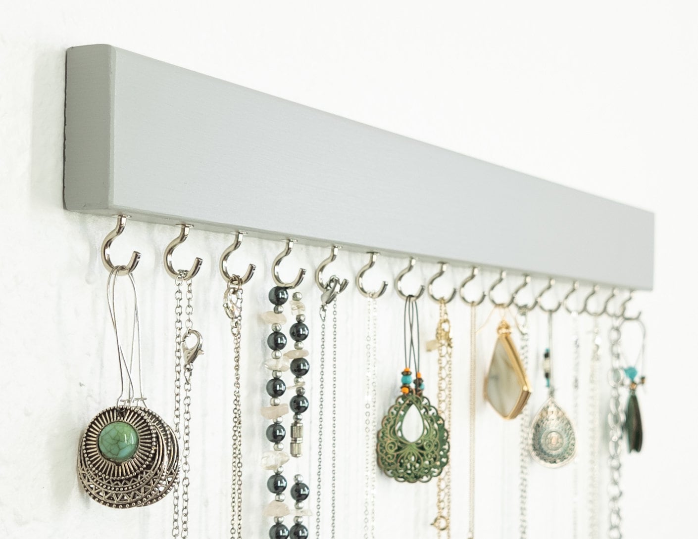 Display your Jewelry | This Organizer turns your collection into Wall Art with a simple and elegant finish. 29 color options or personalize