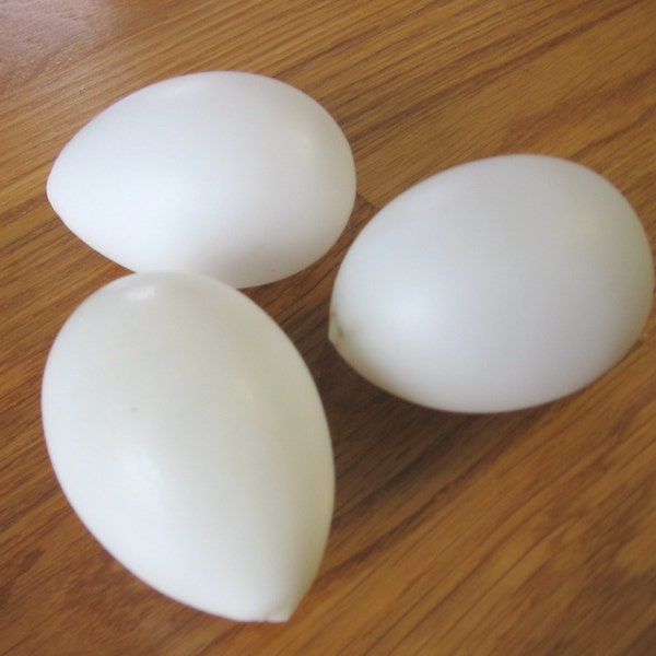 Three Antique Blown Milk Glass Eggs