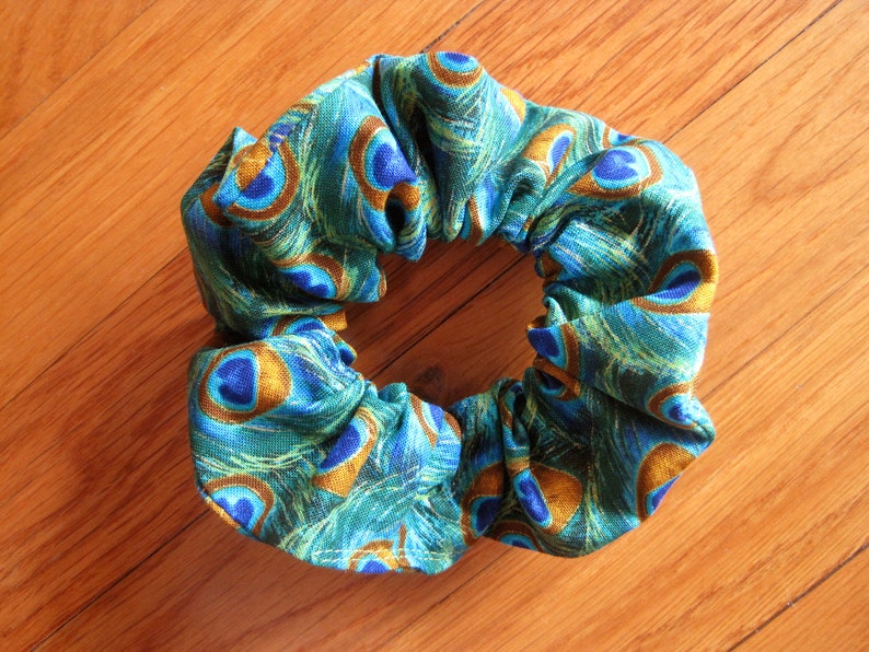 Novelty Scrunchie Peacock Feathers Gold Navy Turquoise Blue image 0