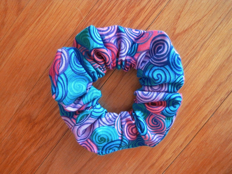 Novelty Scrunchie Circular Swirls Teal Blue Salmon Pink Lilac image 0