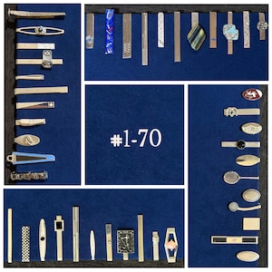 May include: A collection of assorted metal tie clips and tie bars displayed in a grid, featuring various shapes, textures, and decorative accents, with the text #1-70 centered in the middle of the display. The items include plain, engraved, and inlaid designs.