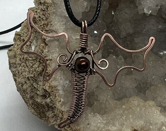 Antiqued copper wire wrapped dragon pendant