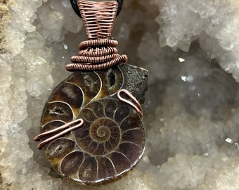 Antiqued copper wire wrapped ammonite pendant