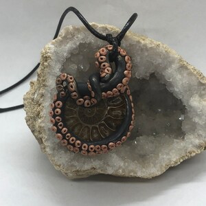Polymer clay ammonite fossil pendant