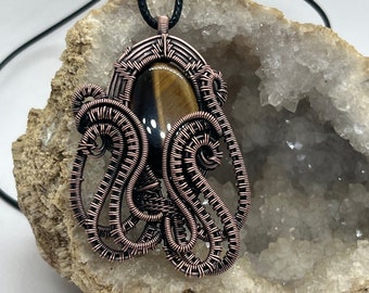 Antiqued copper wire wrapped tiger eye octopus pendant
