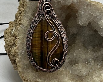 Antiqued copper wire wrapped tiger eyependant