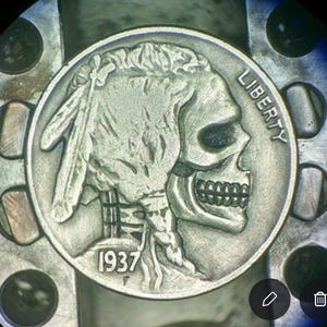 Skull Indian head hobo nickel by SHANE HUNTER carved on a real Buffalo nickel...