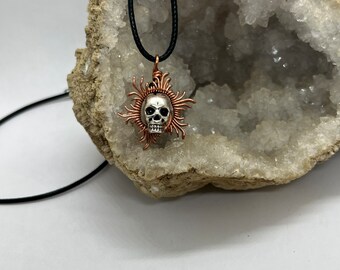 Wire wrapped skull sun pendant