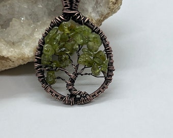 Antiqued copper wire wrapped Peridot tree of life pendant