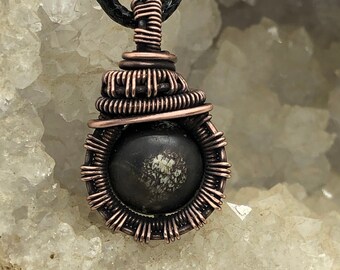Antiqued copper wire wrapped black bead pendant