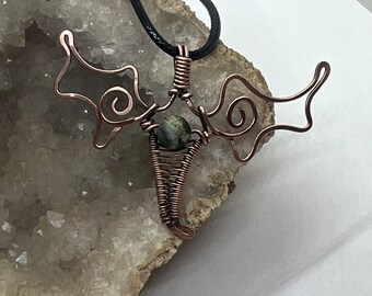 Antiqued copper wire wrapped dragon pendant