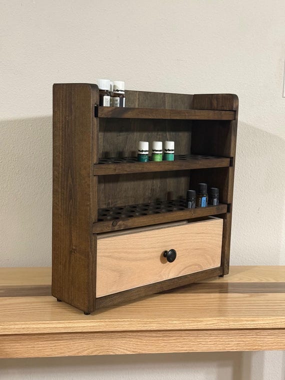 Essential oil storage shelf with drawer