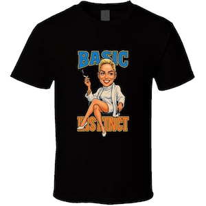 May include: Black t-shirt featuring a cartoon illustration of a woman with the text "BASIC INSTINCT" in blue and orange. The woman is depicted with blonde hair, a white outfit, and a cigarette.