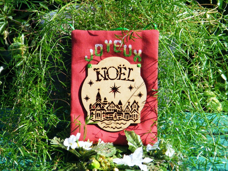 Joyeux Noel Village Christmas Hanging Semi Kit in counted cross stitch with an MDF laser cut hanging to attach.