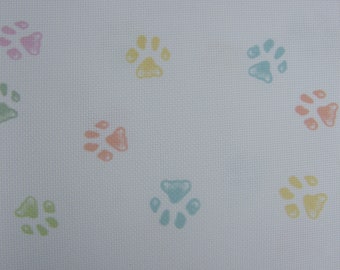 18 count white Aida printed with multi-coloured Pawprints. Various sizes. Printed Pawprints on Aida.