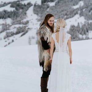 Soft draping wedding veil with lace edge. Ivory tulle wedding veil in lower back, fingertip, waltz, floor and chapel lengths