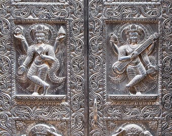 Doors of Kathmandu | Kathmandu, Nepal~ door, doorway, metal, silver, ancient, religious, sun, god, goddess, metal carving, ancient, street