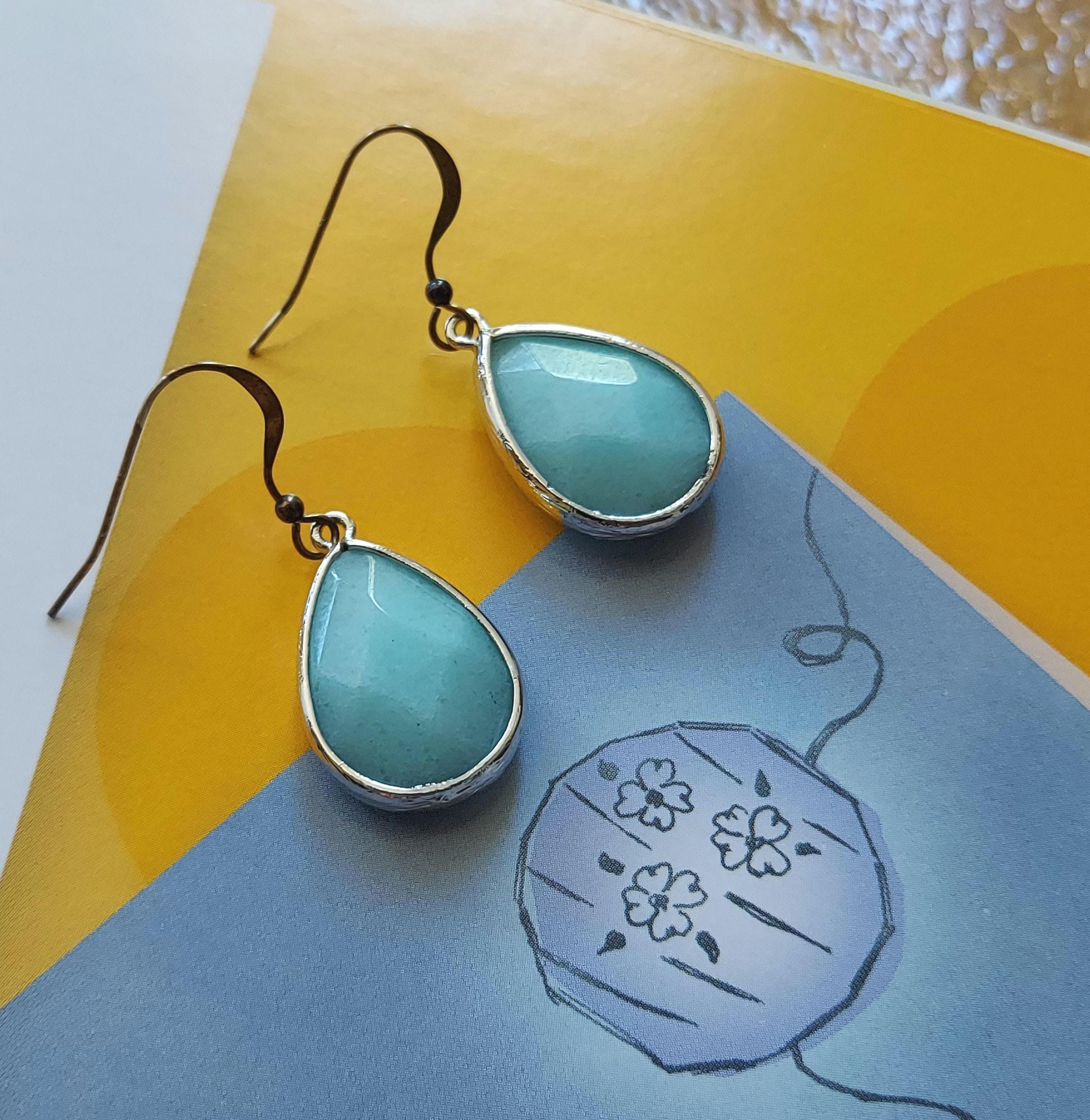 ラリマー ティアドロップ イヤリング：シルバーベゼル、スカイブルー