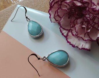 ラリマー ティアドロップ イヤリング：シルバーベゼル、スカイブルー