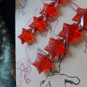 Red Star Earrings, Light, Linear | 1980s Swingy Color Pop  | Jelly Plastic Fun | 2.75 Inch Length, Pierced Posts |  Gift Boxed
