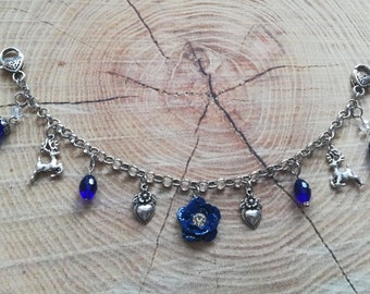 Charivari / Schürzenschmuck / Miederschmuck mit blauen Zierteilen